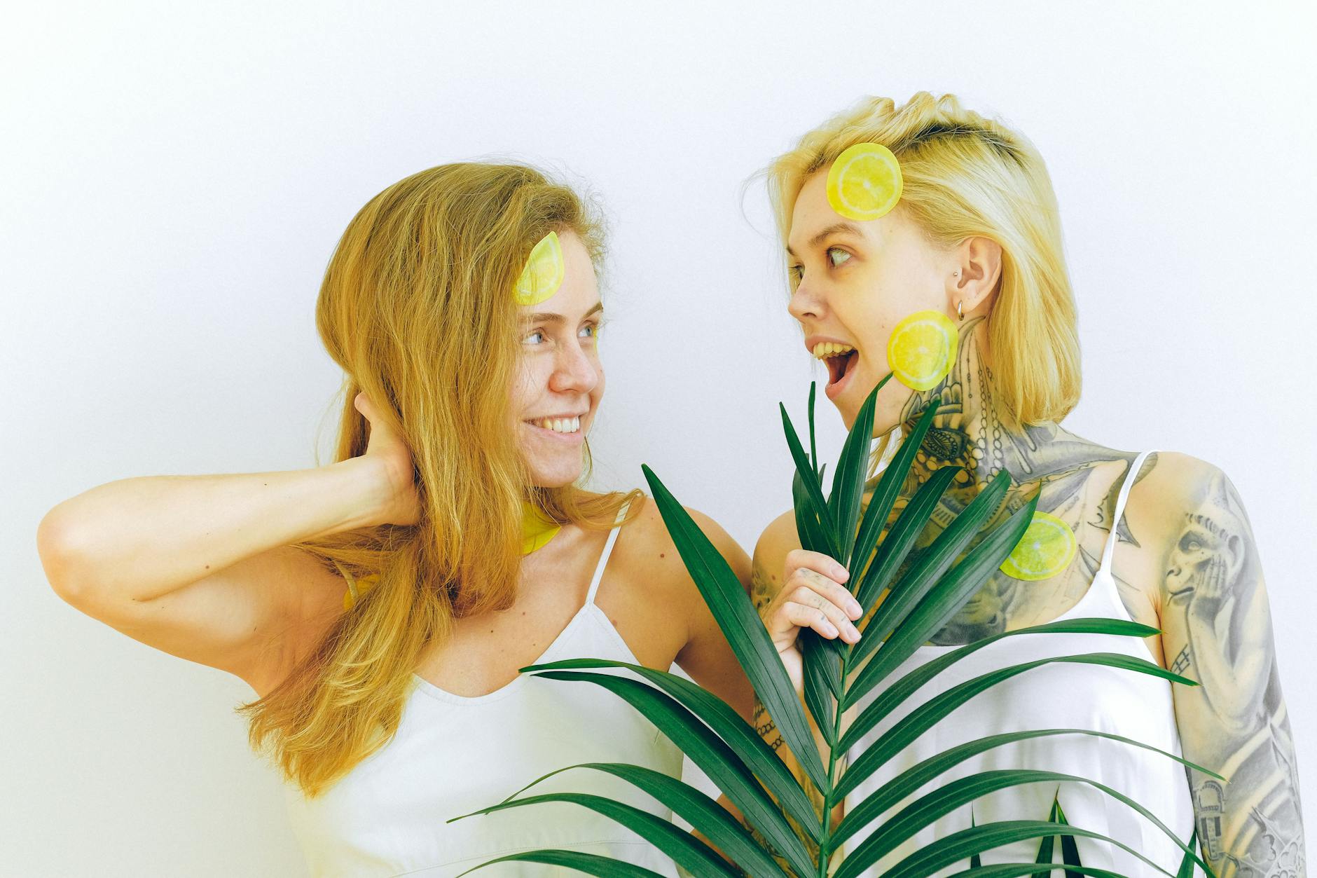Two smiling women with joy expressing postpartum connection and intimacy